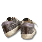 Super-Star in glitter with a brown star and lilac heel tab
